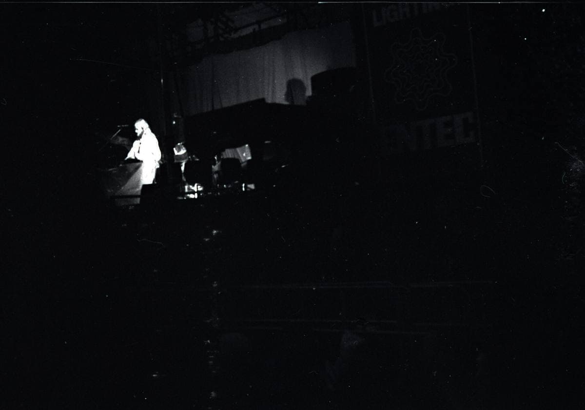 A band on an outdoor festival stage in 1975
