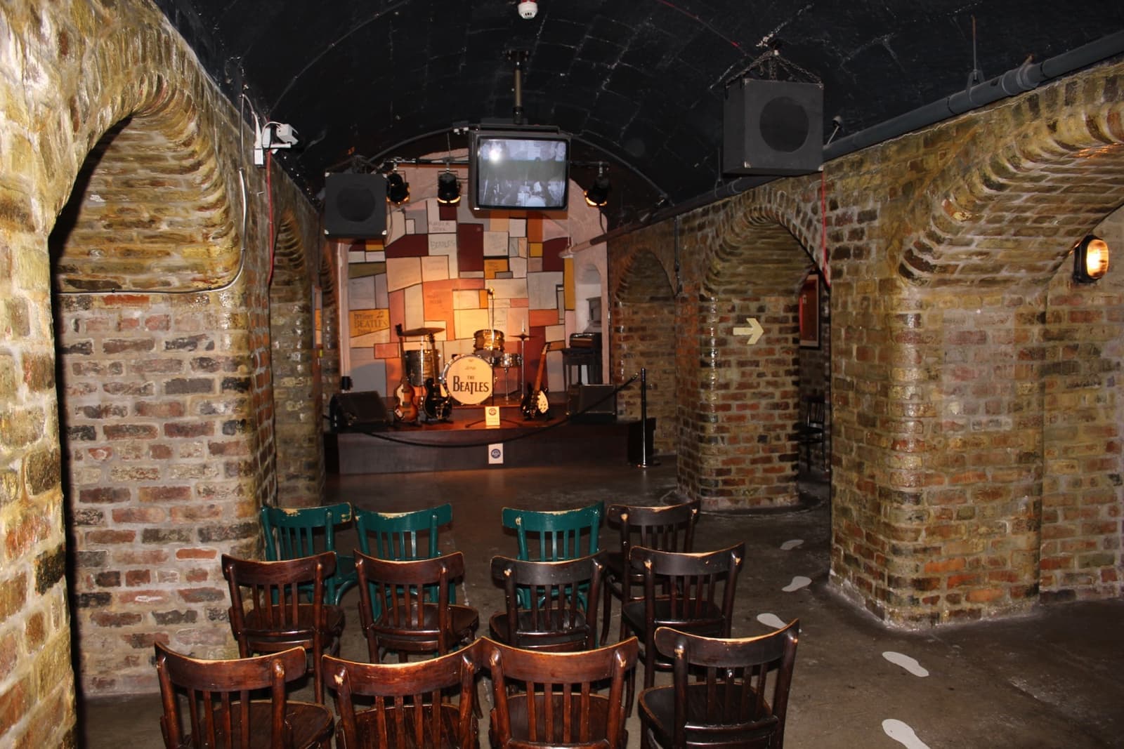 A brick-vaulted stage recreated in a museum