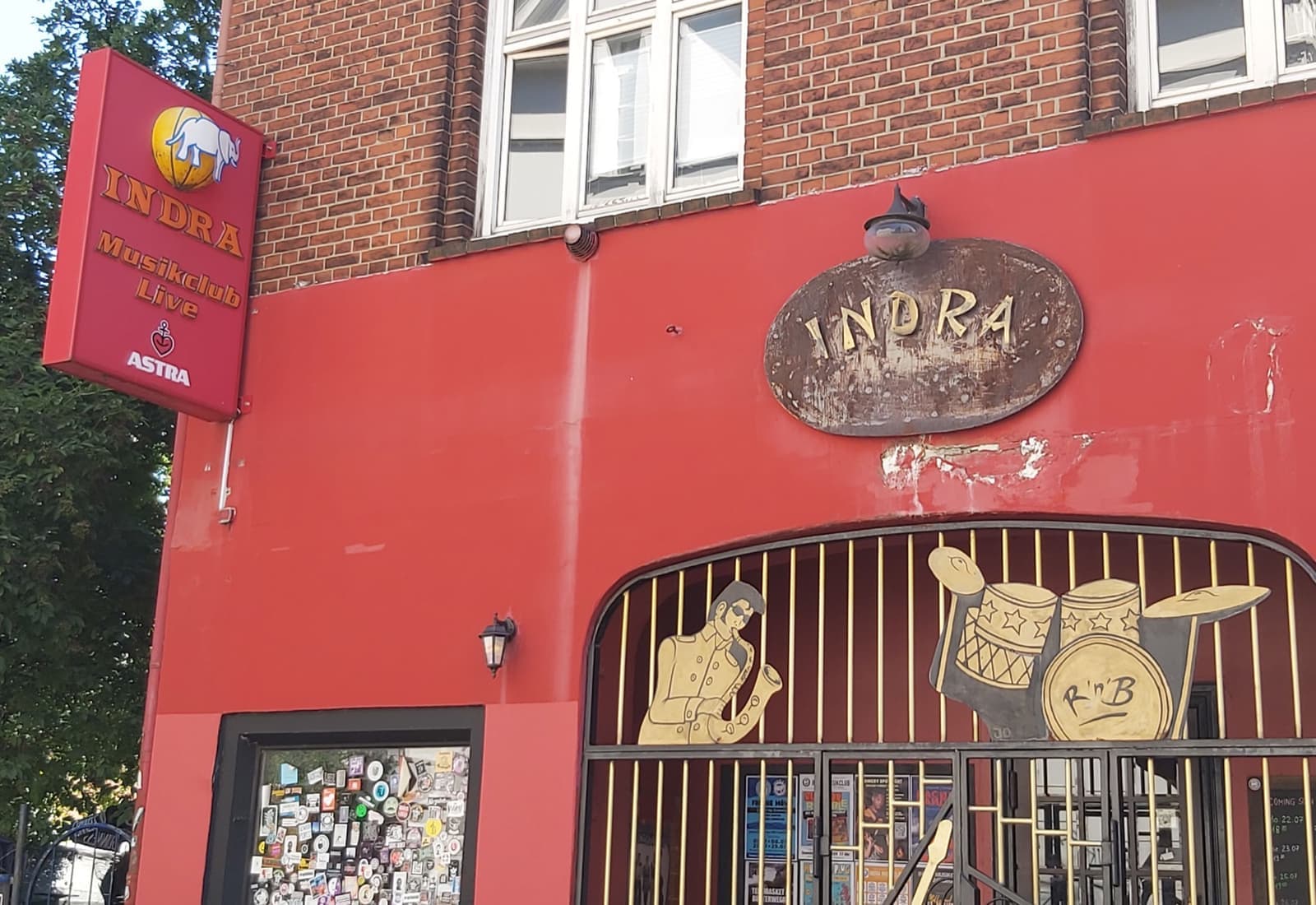 A red club frontage with the INDRA sign