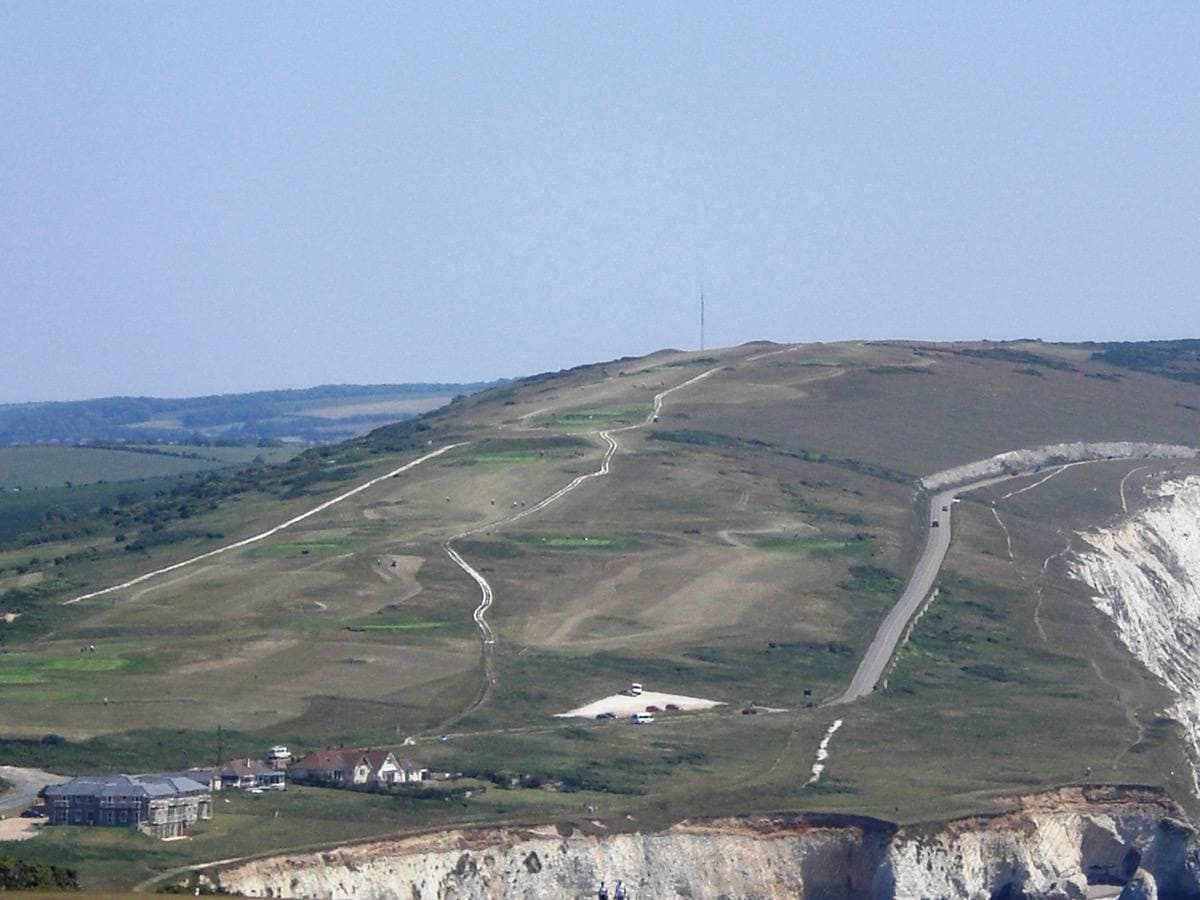 Green chalk downland rising beside the sea on the Isle of Wight