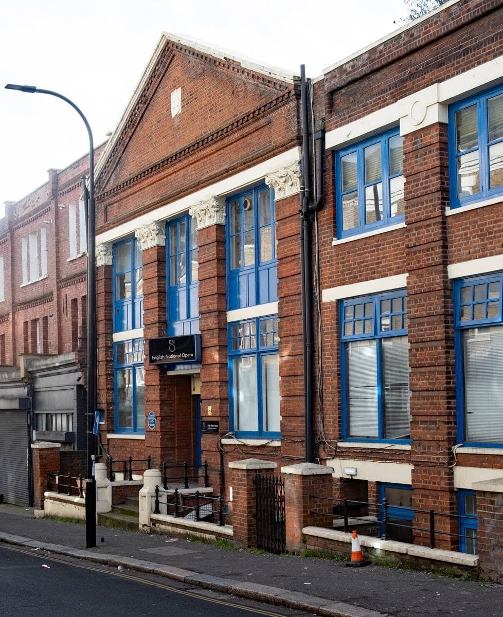A long red-brick Victorian building on a West Hampstead street