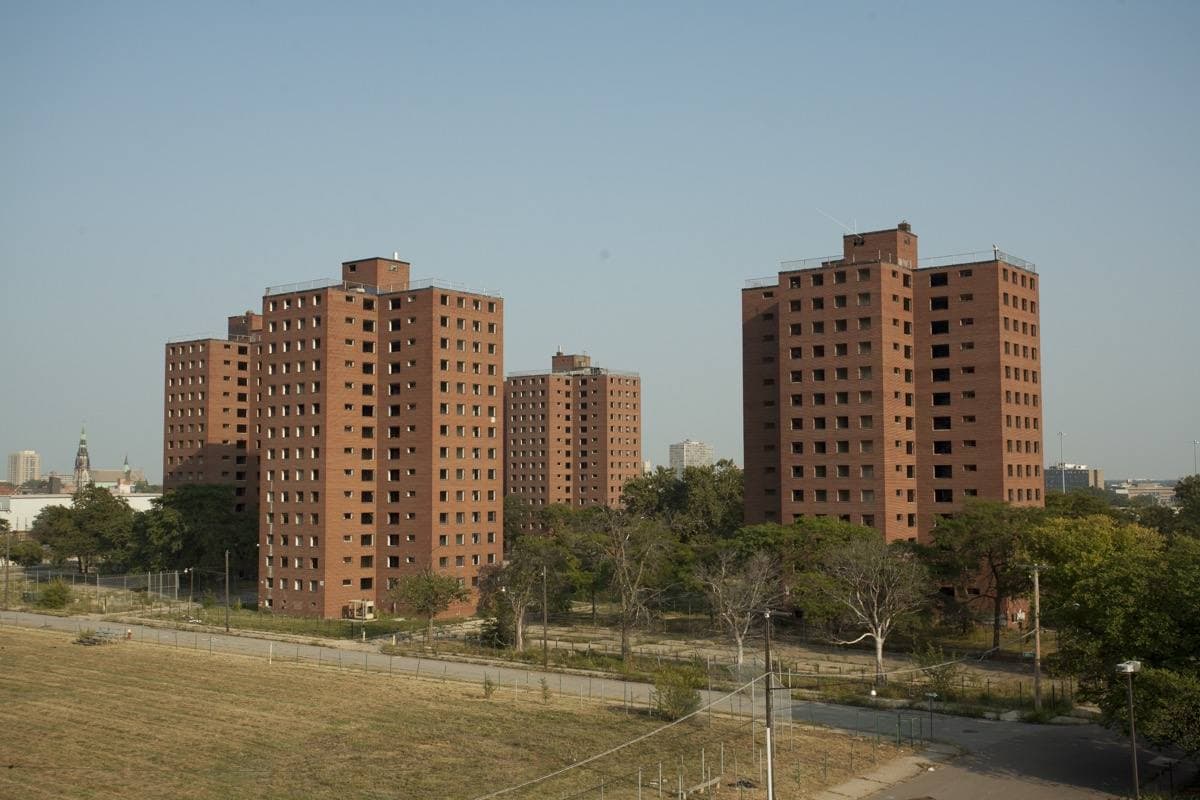 Four tall housing towers in Detroit in 2010, before they came down