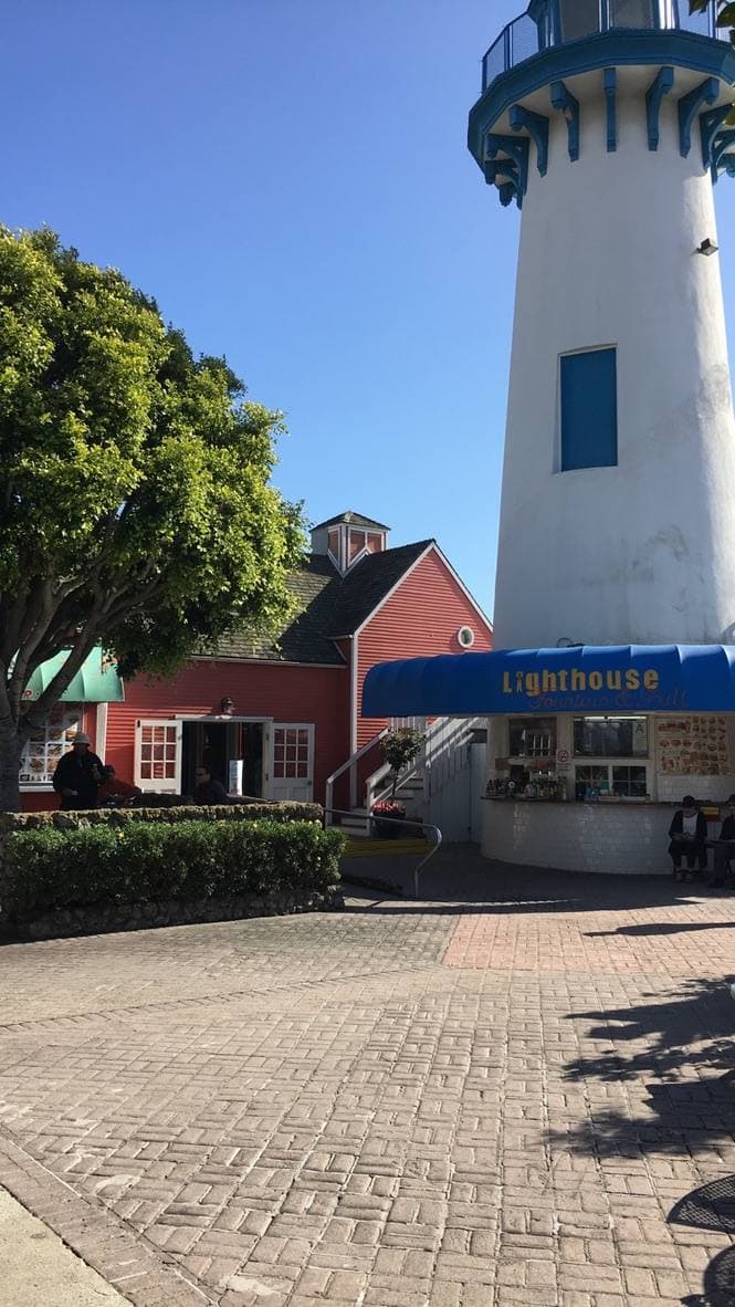 The Fisherman’s Village lighthouse against a blue sky