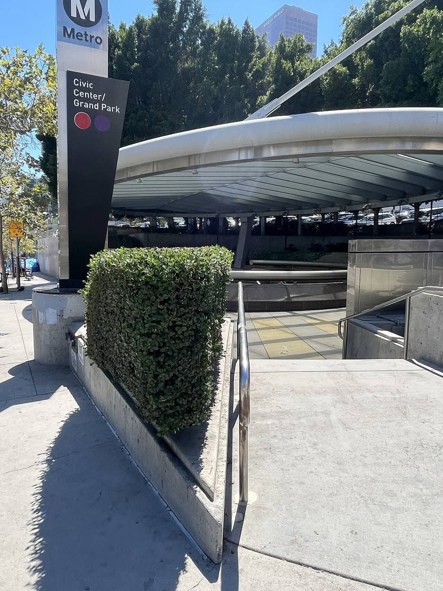 A metro station entrance on a downtown street