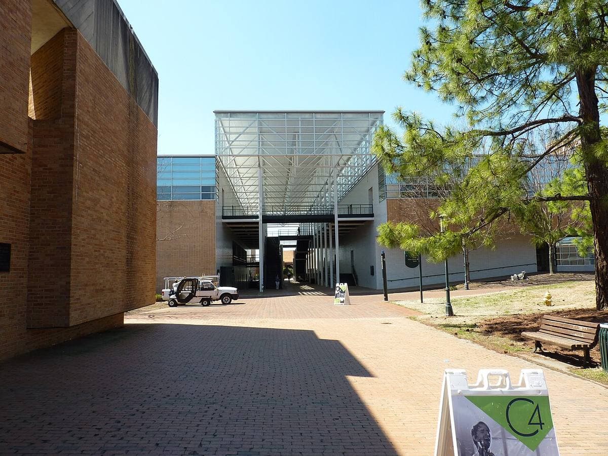 Brick university buildings and trees on a campus