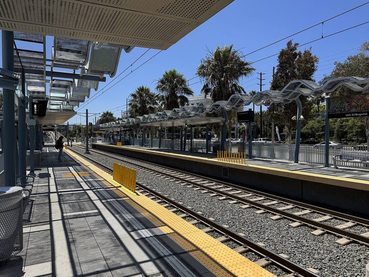 A light-rail platform under a canopy in Santa Monica