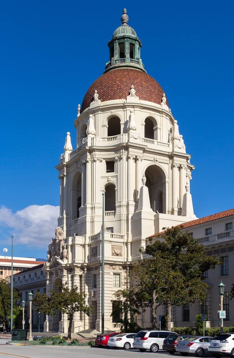 A domed civic building with arches and a courtyard