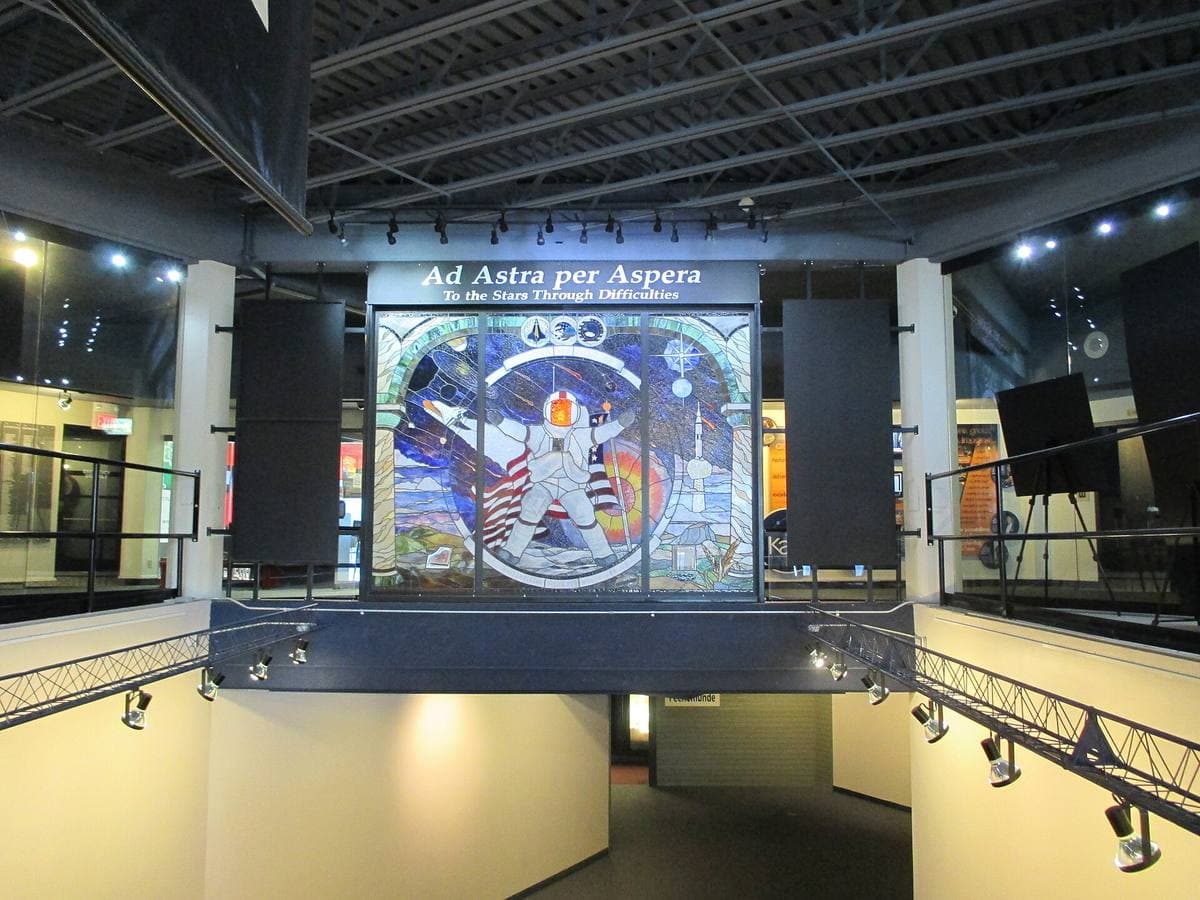 A museum entrance hall with spacecraft displays