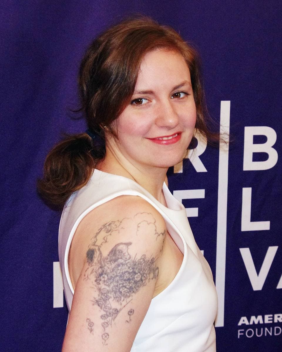 Lena Dunham smiling, dark bobbed hair, April 2012