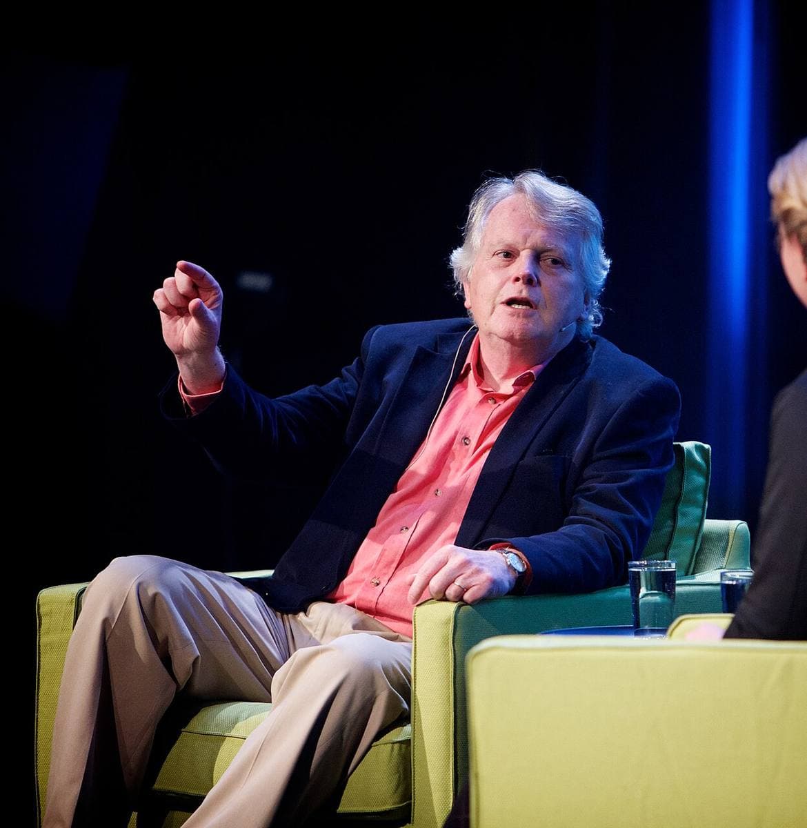 Michael Dobbs speaking on a stage