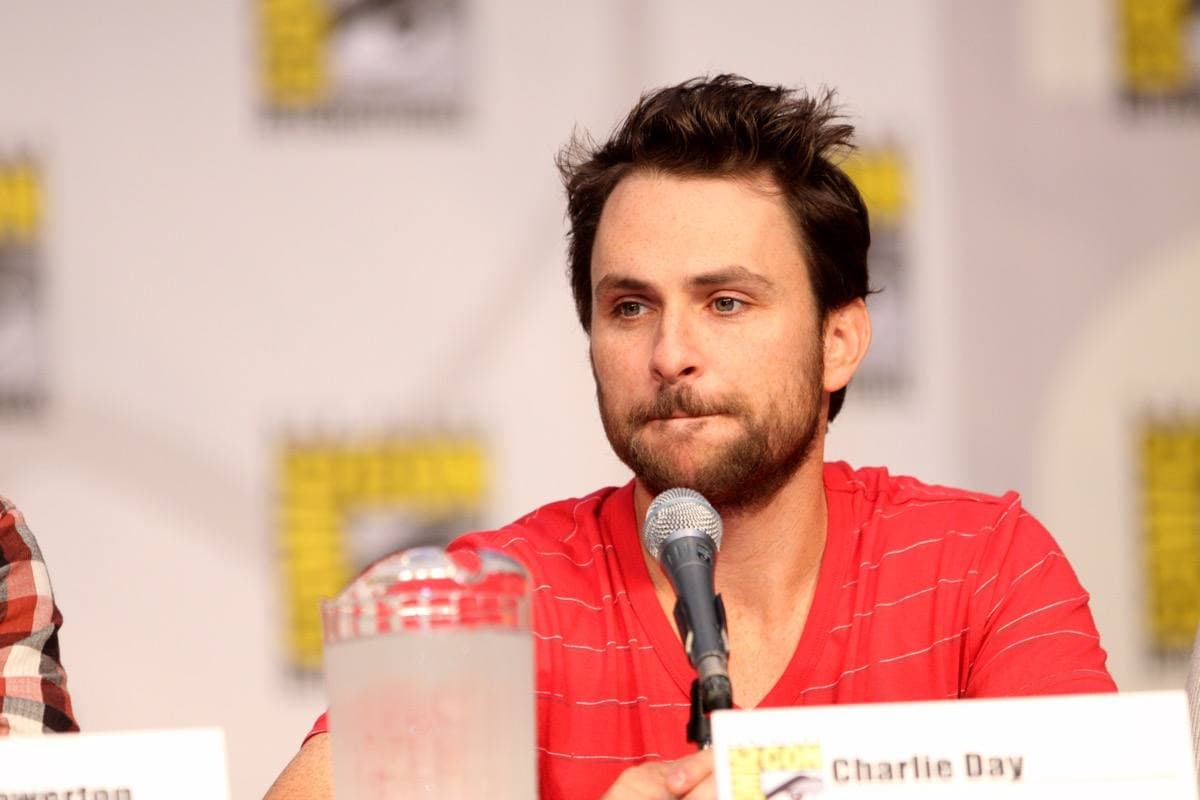 Charlie Day at a panel table
