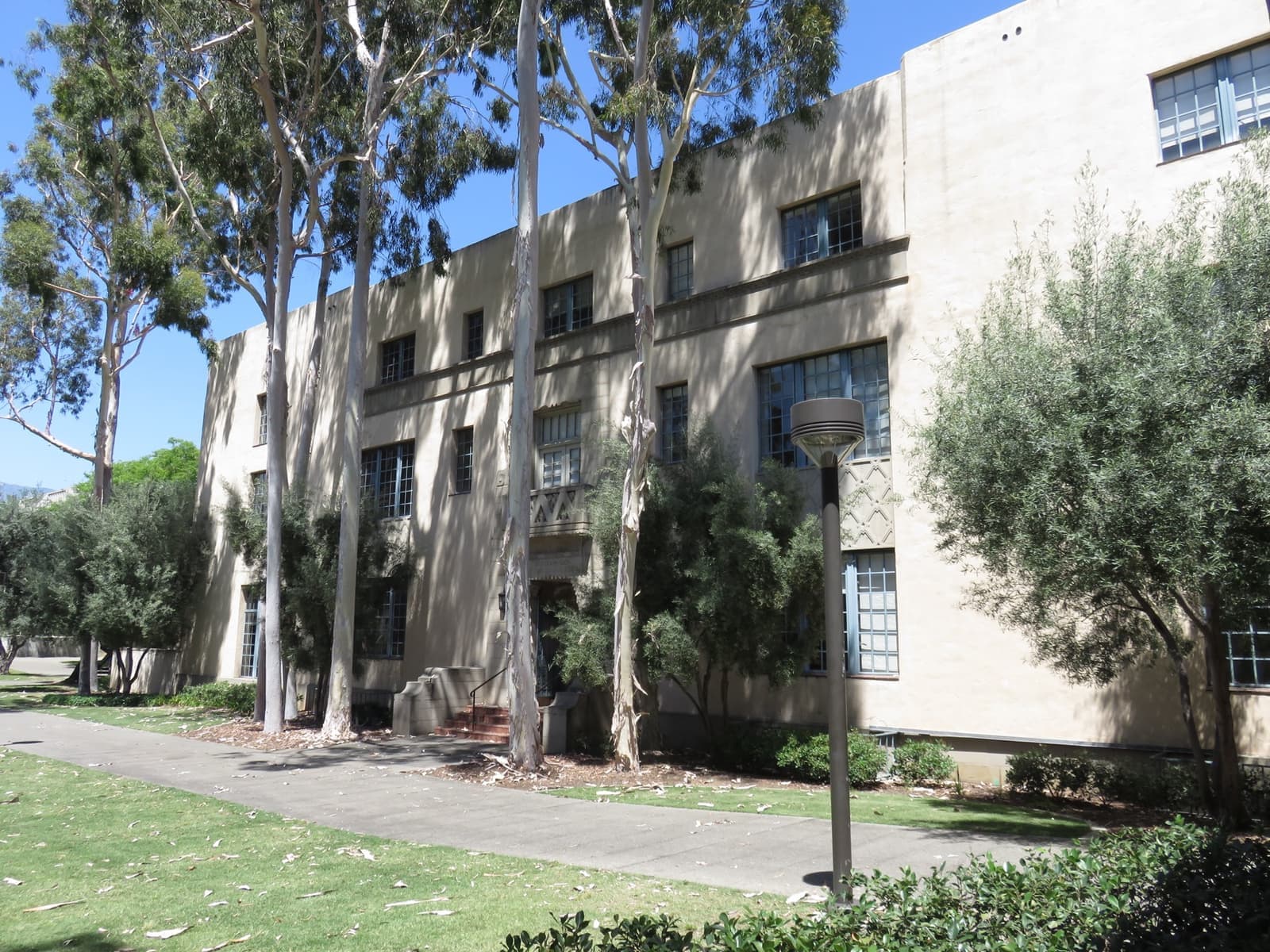 A Mediterranean-style hall with arches and tiled roofs