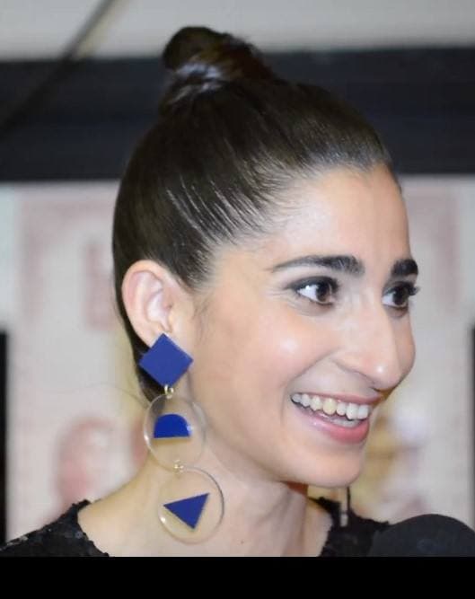 Alba Flores with dark hair