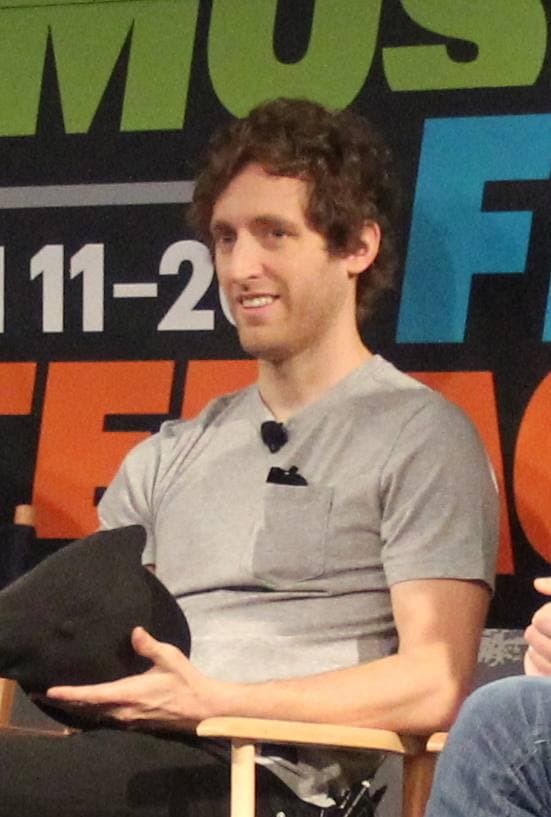 Thomas Middleditch, bearded, speaking on a panel