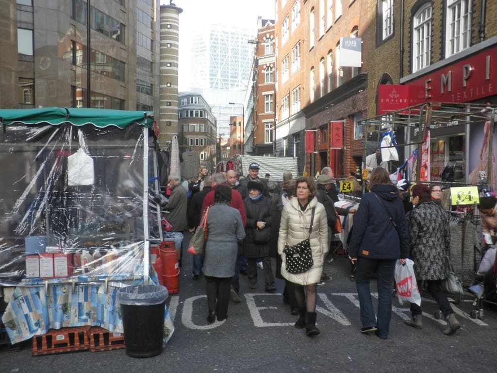 Crowds walking between market stalls on Middlesex Street