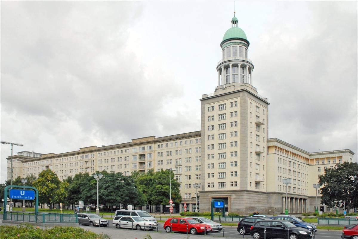 Two domed towers flanking a wide junction on Karl-Marx-Allee