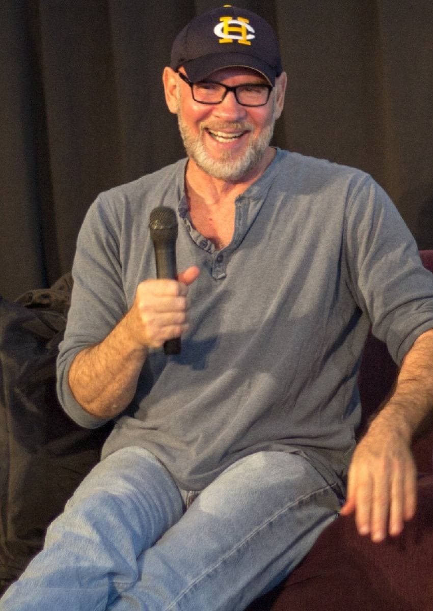 Mitch Pileggi, bald, smiling at a fan convention