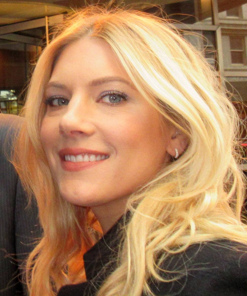 Katheryn Winnick smiling, fair hair loose