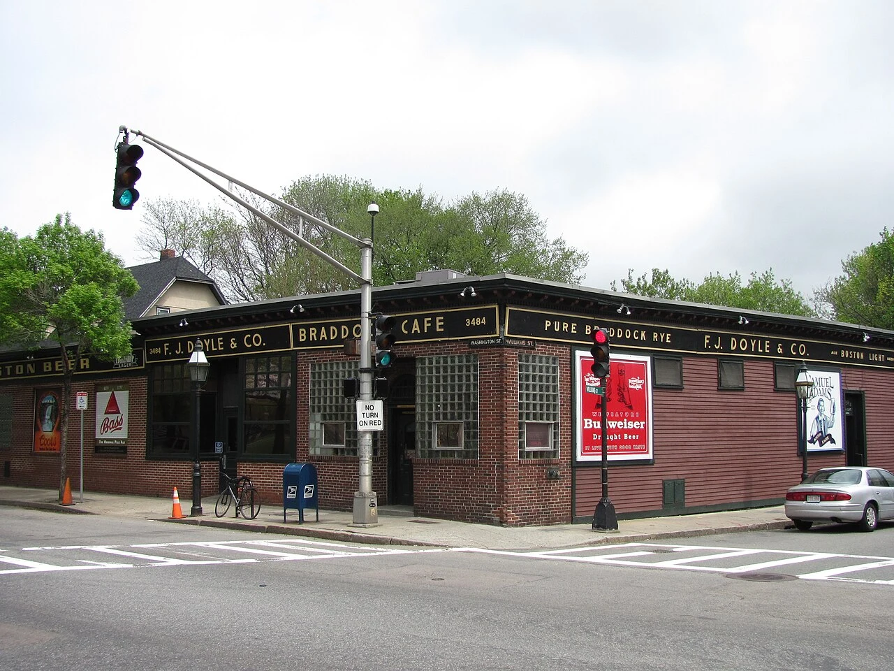 Doyle’s Cafe brick corner building, with 3484 Washington Street number visible in 2011