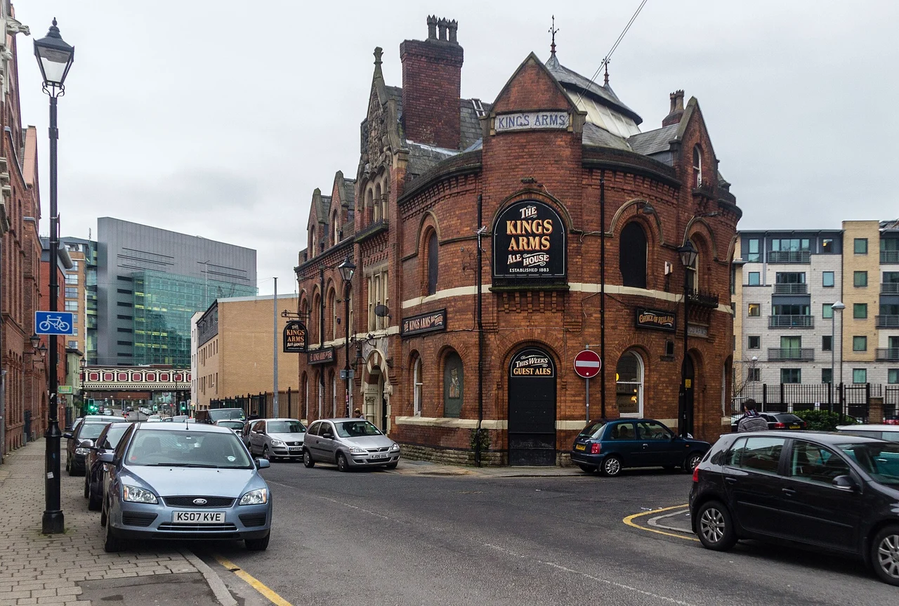 The Kings Arms red-brick corner pub in Salford with its named sign