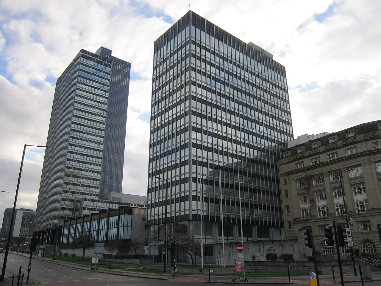 New Century House and its attached low New Century Hall, with the CIS Tower behind, Manchester, in December 2014