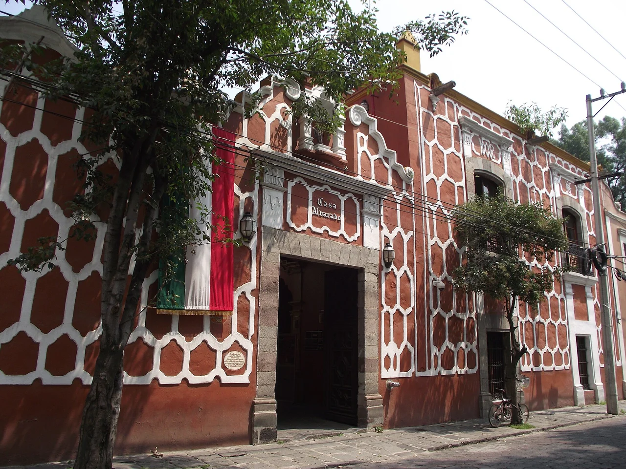 Tree-lined facade and entrance of Fonoteca Nacional