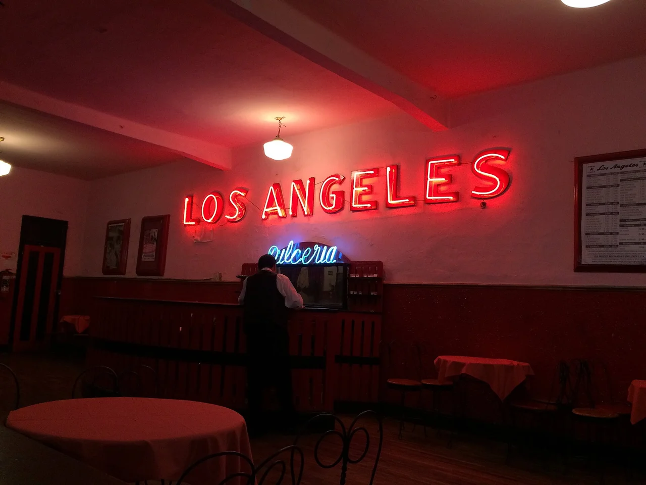 Los Ángeles neon sign and candy-counter area inside Salón Los Ángeles, 2017