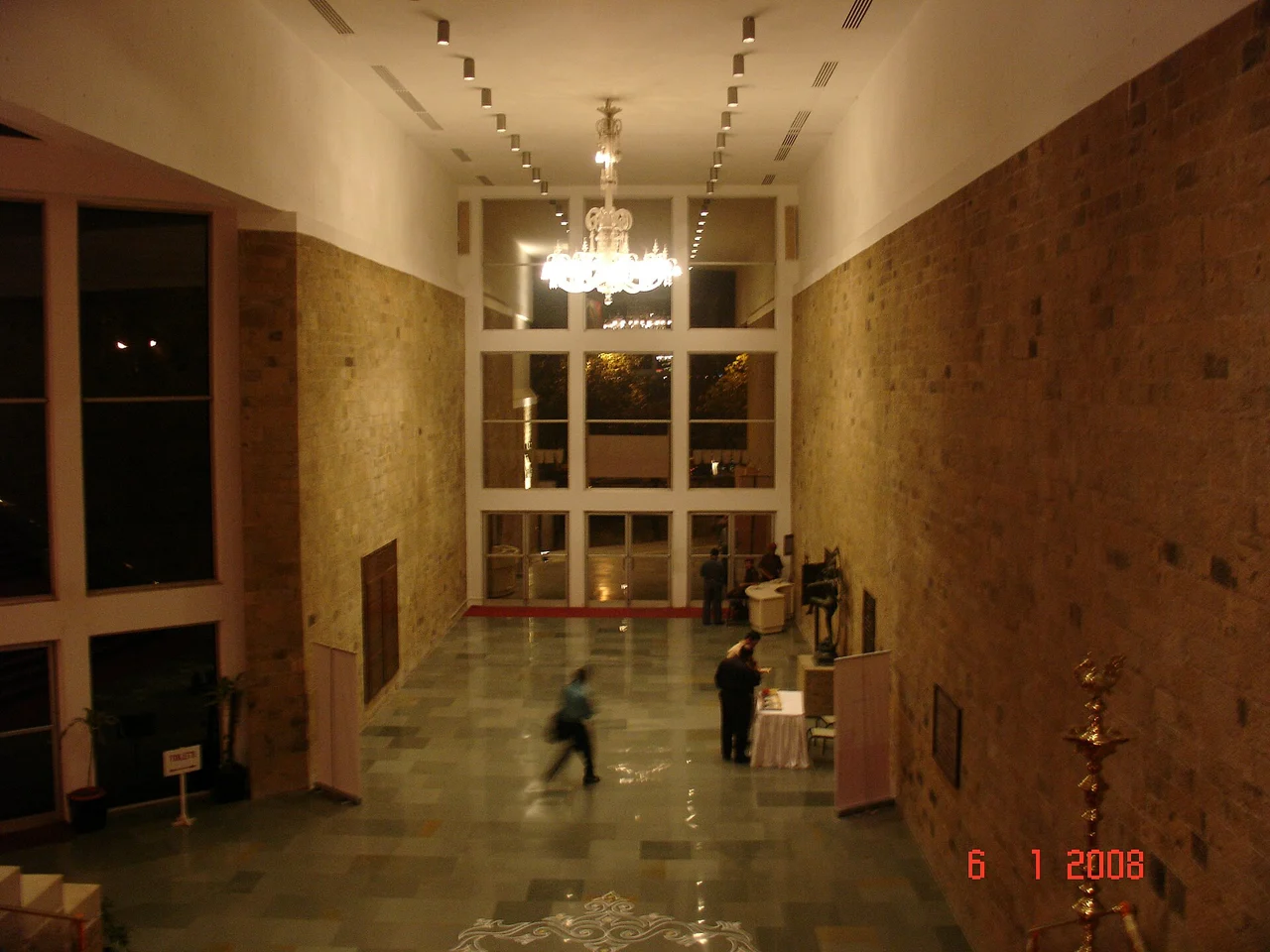 Tall lobby, chandelier and stone walls in the Tata Theatre foyer, photographed in 2008
