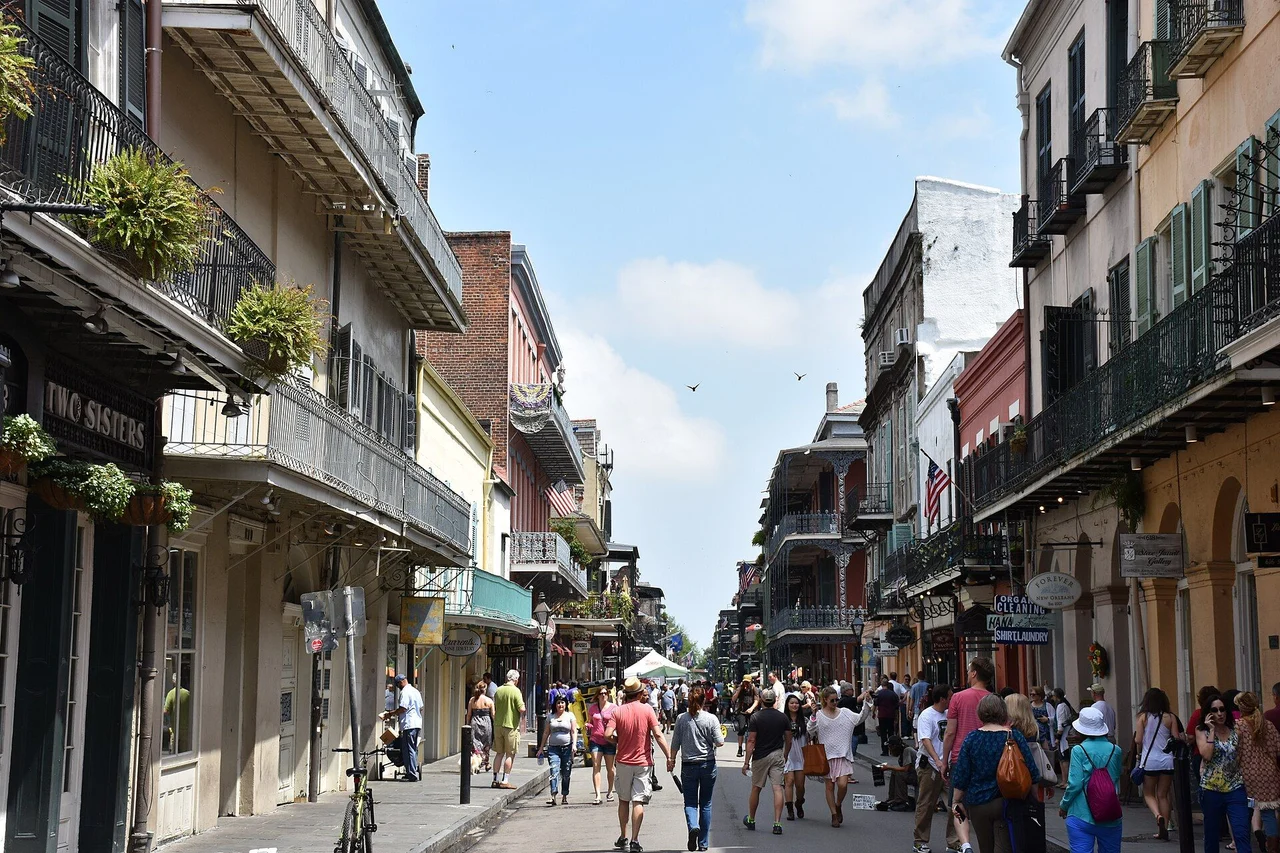 Royal Street in the French Quarter looking northeast from St. Peter Street, with balconies and pedestrians, 2015