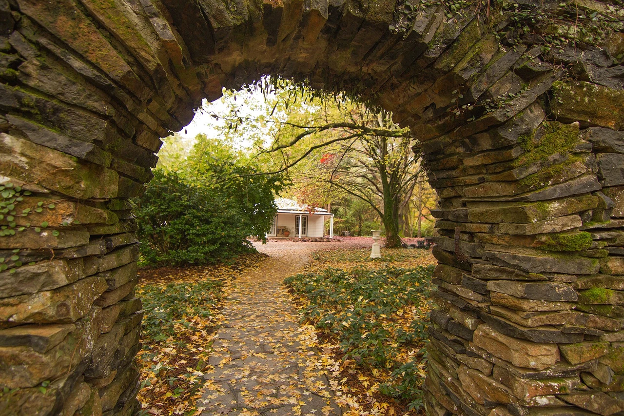 Stone arch and autumn garden at Breenhold Gardens, Mount Wilson, April 2014. Regional garden context, not a claimed film camera position.