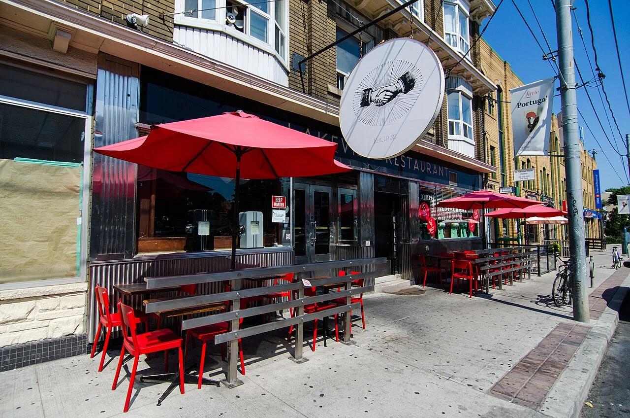 The Lakeview restaurant facade and red patio umbrellas in Toronto in September 2016