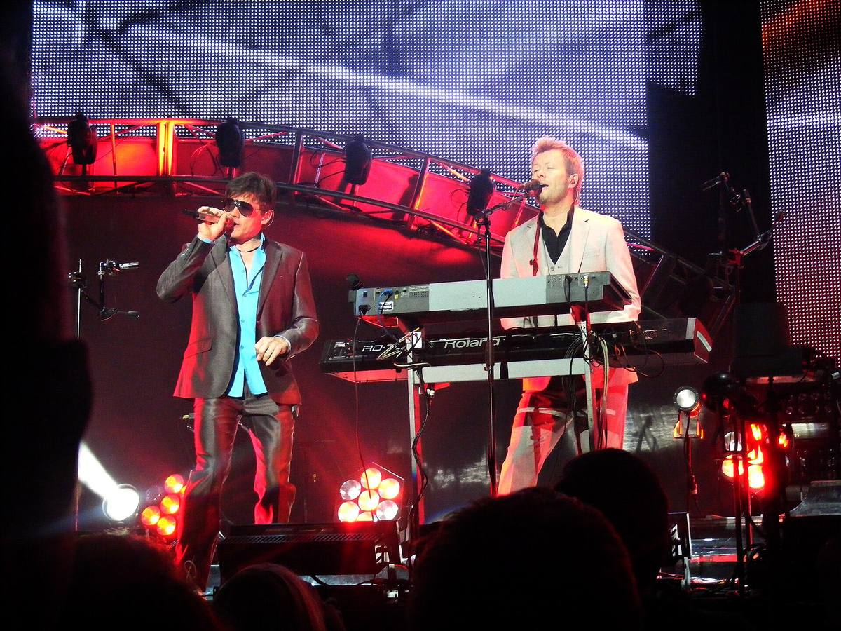 a-ha performing on a lit stage during their 2010 farewell tour