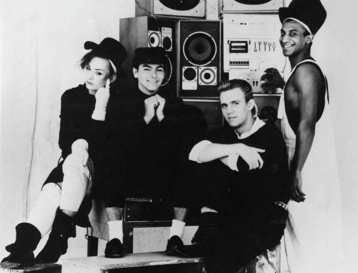 The four members of Culture Club posed in black and white, about 1983