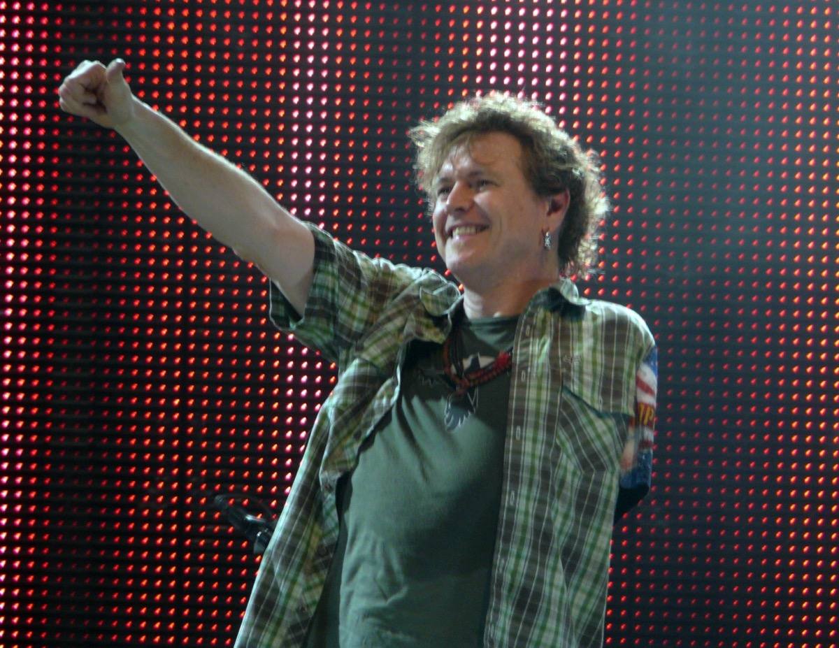 Rick Allen playing his drum kit on stage in 2008