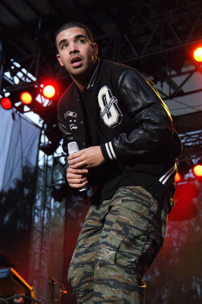 Drake on stage with a microphone in 2010