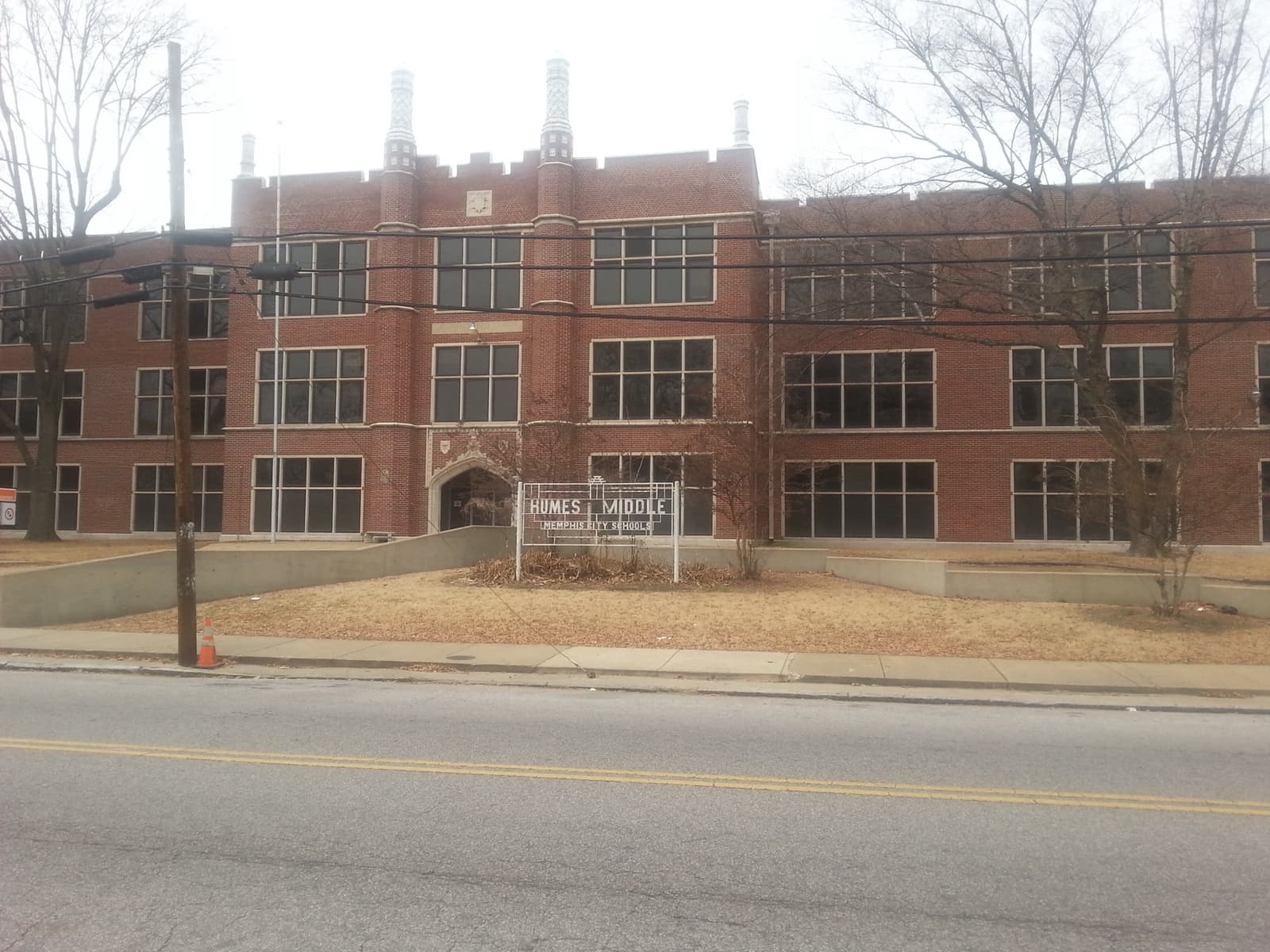The brick entrance of a 1920s school