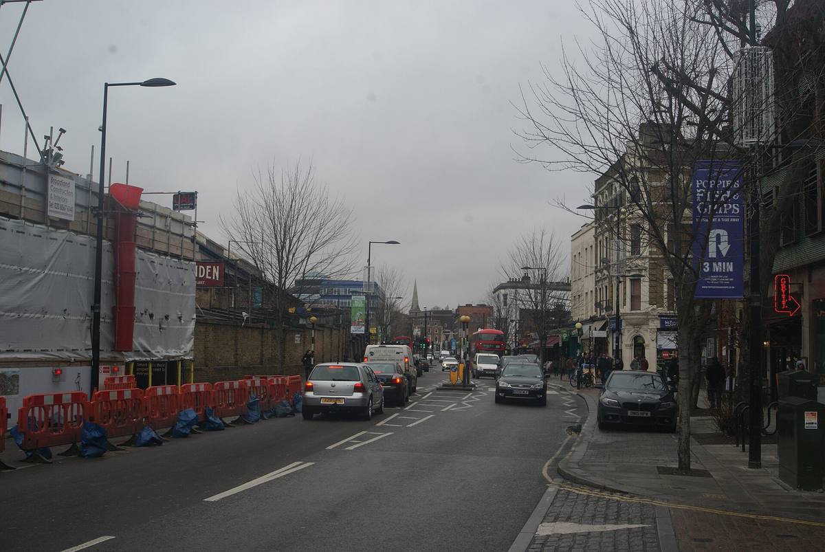 Looking up Chalk Farm Road with shops on both sides