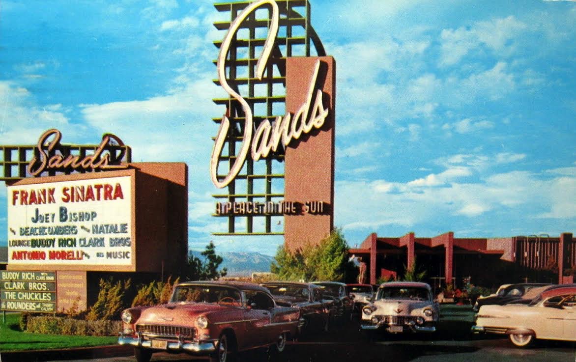 A tall sign reading Sands with a marquee listing Frank Sinatra