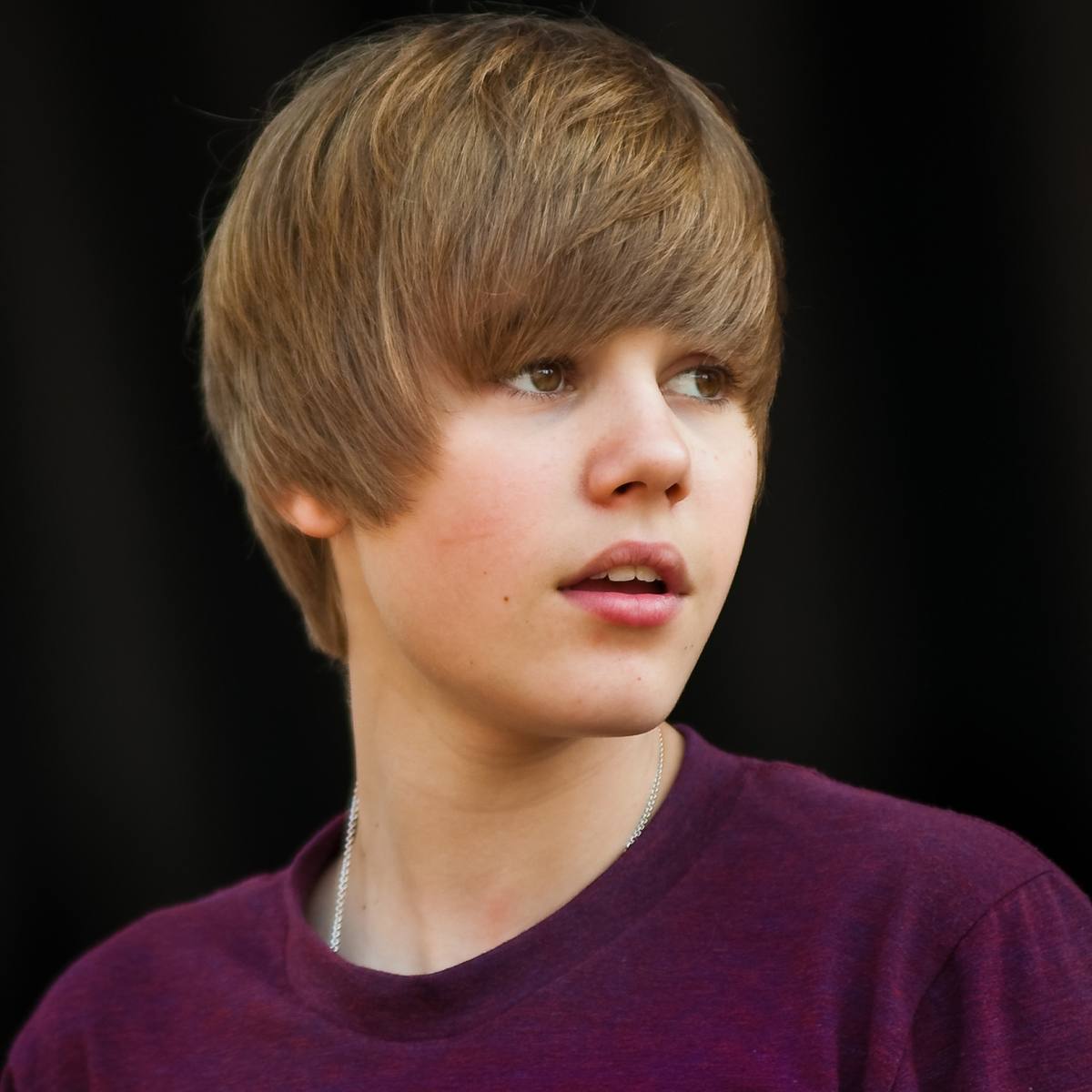 Justin Bieber in April 2010, aged sixteen, with his swept fringe