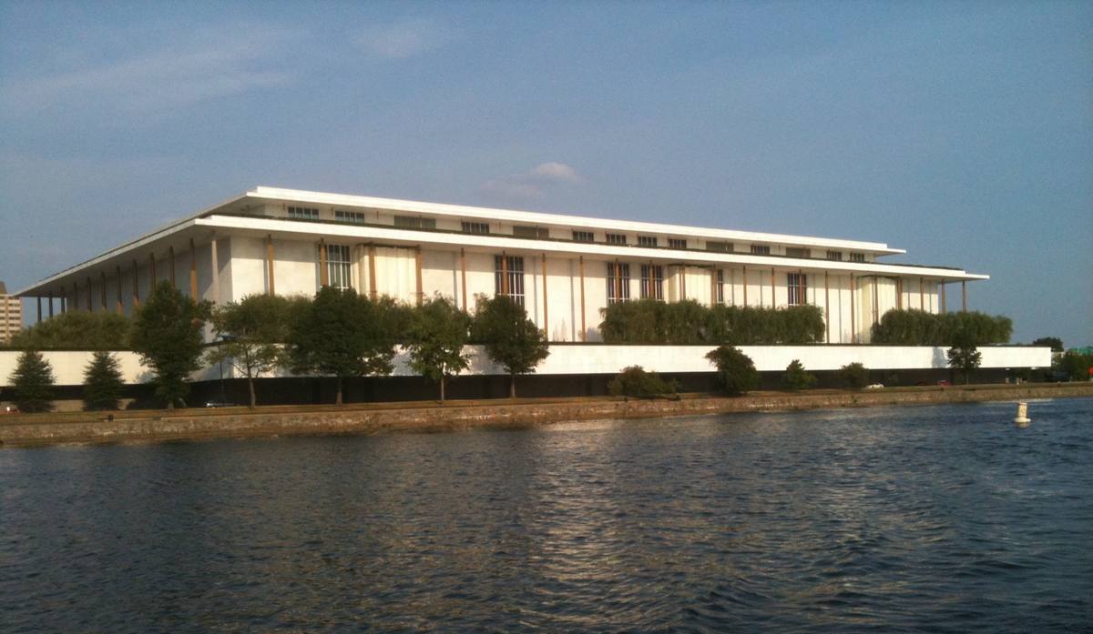 The long white Kennedy Center building above the Potomac River