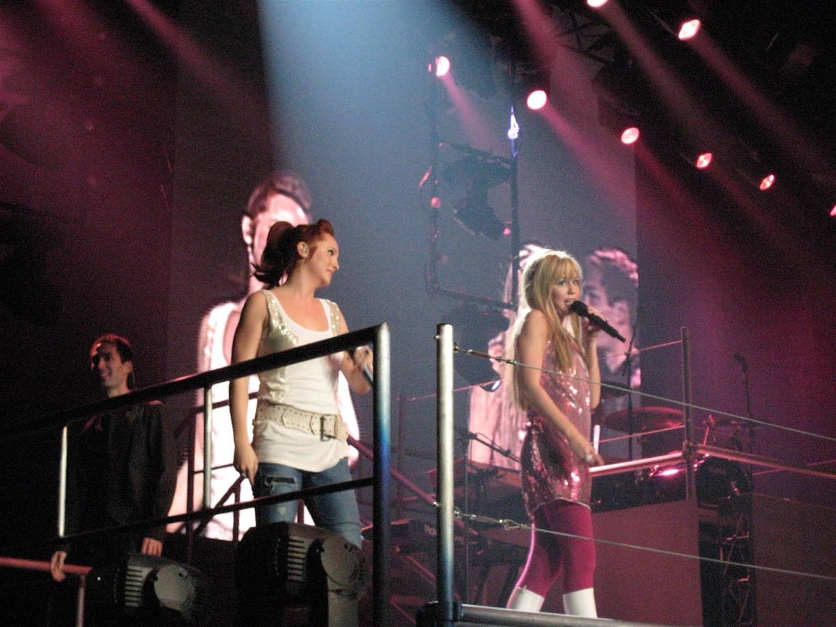 Miley Cyrus performing in a blonde wig as Hannah Montana in 2007