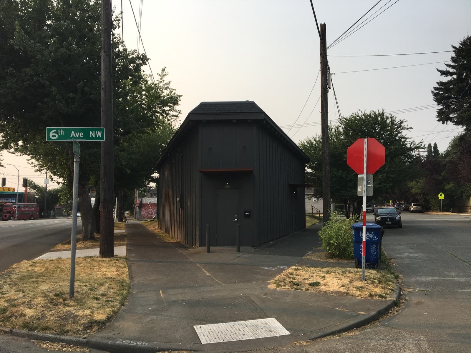 A small triangular single-storey building on a street corner in Ballard