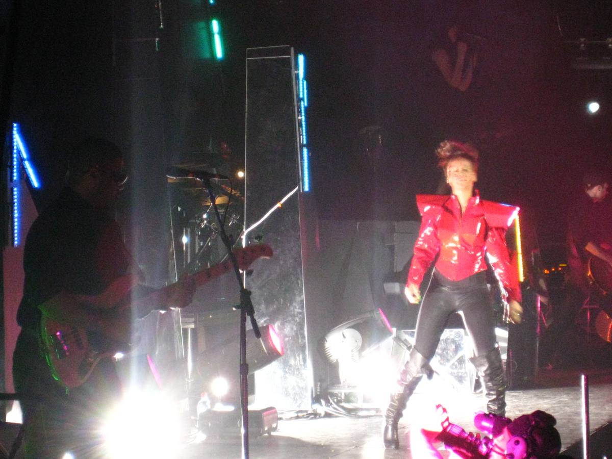 Rihanna performing on an arena stage in 2008