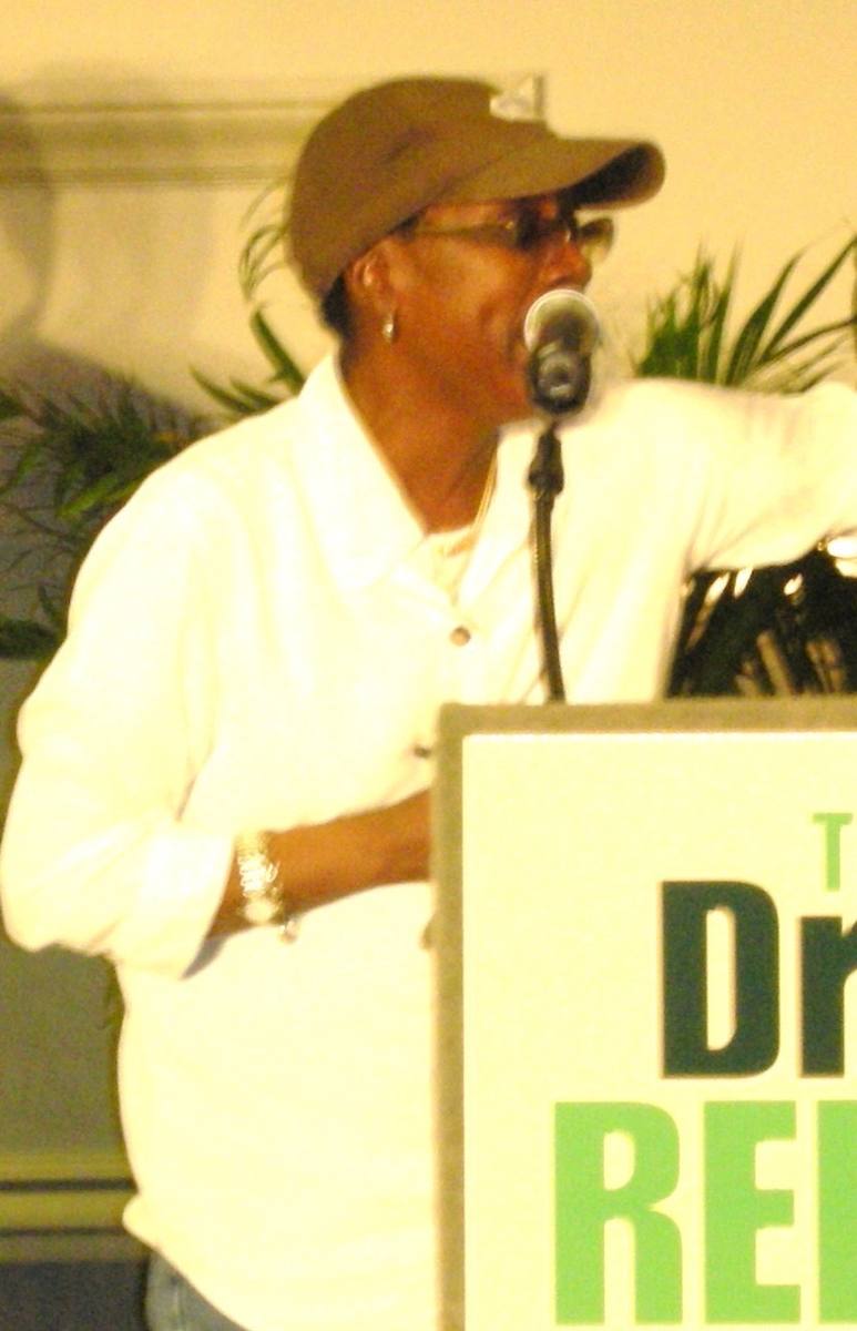 Afeni Shakur speaking at a lectern