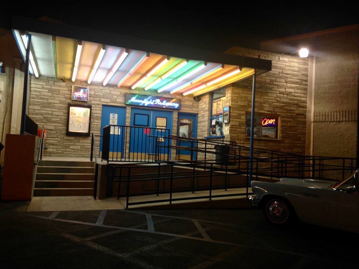 The entrance of a roller rink with its sign