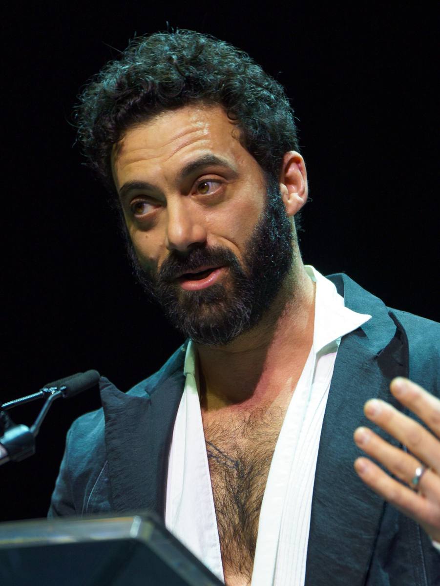 Morgan Spector in a dark jacket